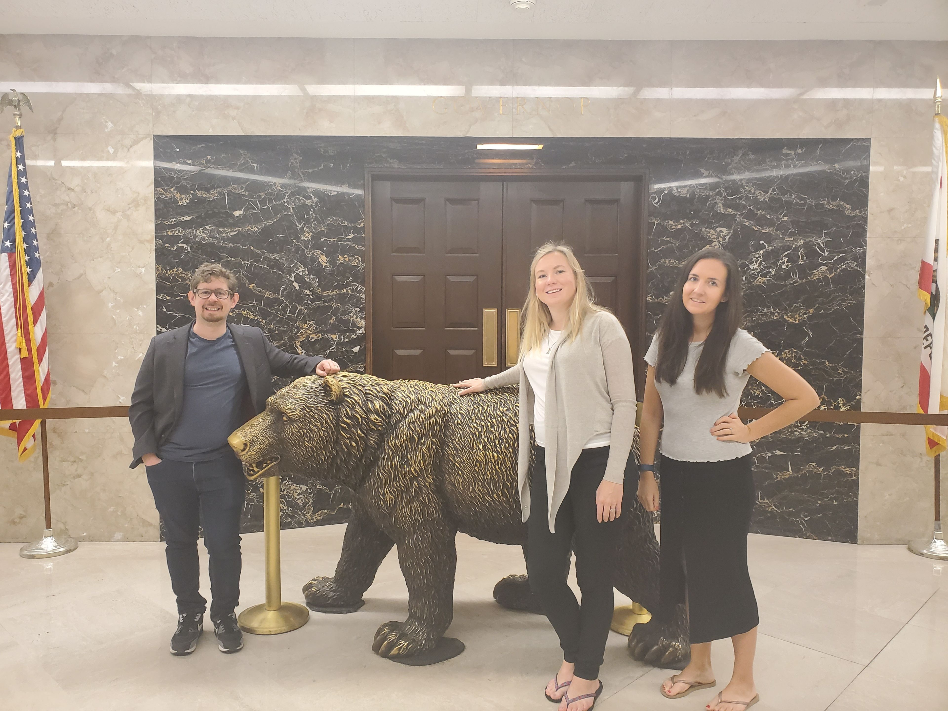 Dai, Emma and Stacey working with the California State Government