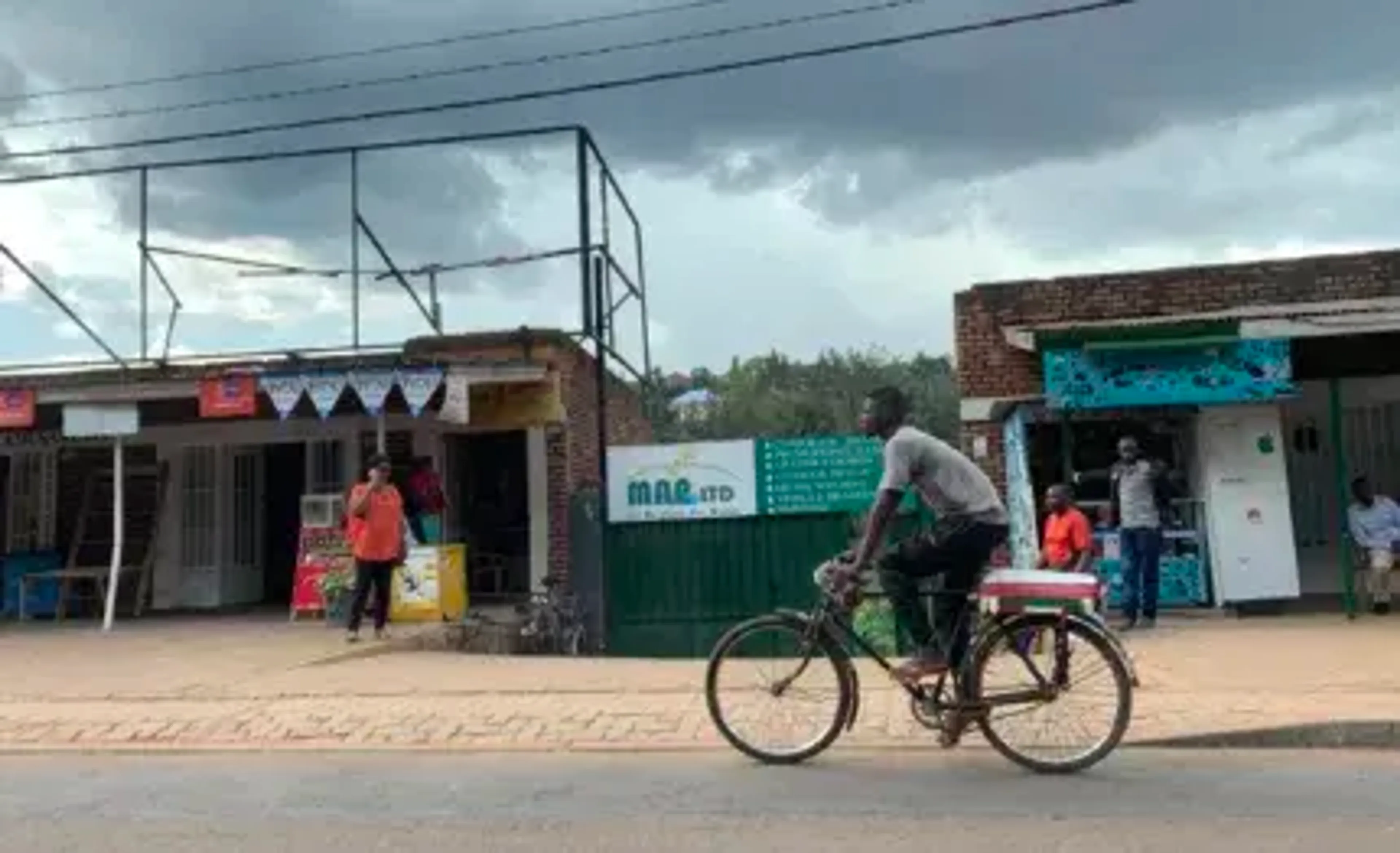 Locals cycling in Kigali Rwanda