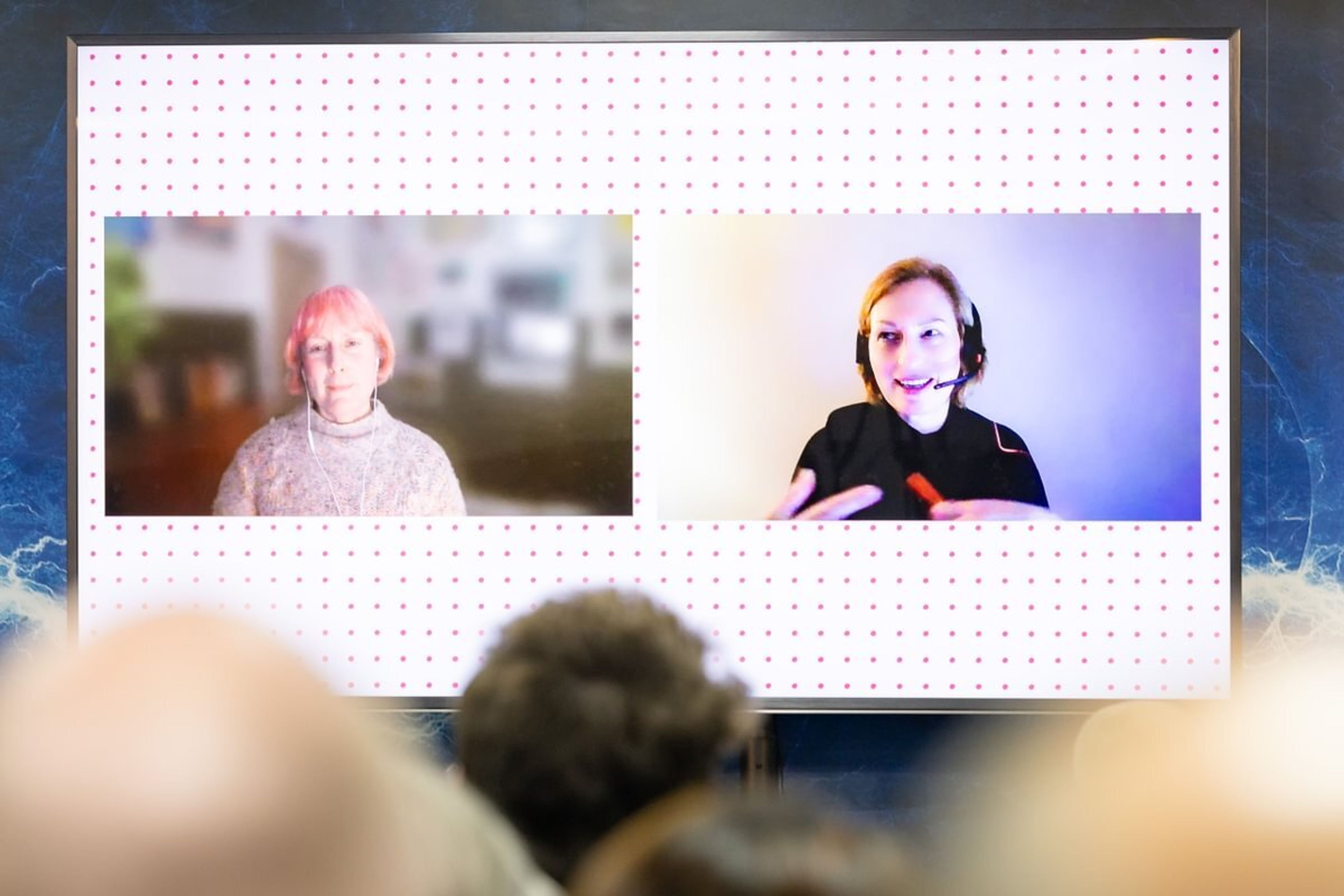 Shona Nicol and Joyce Dalgleish shown on a big screen on a videocall
