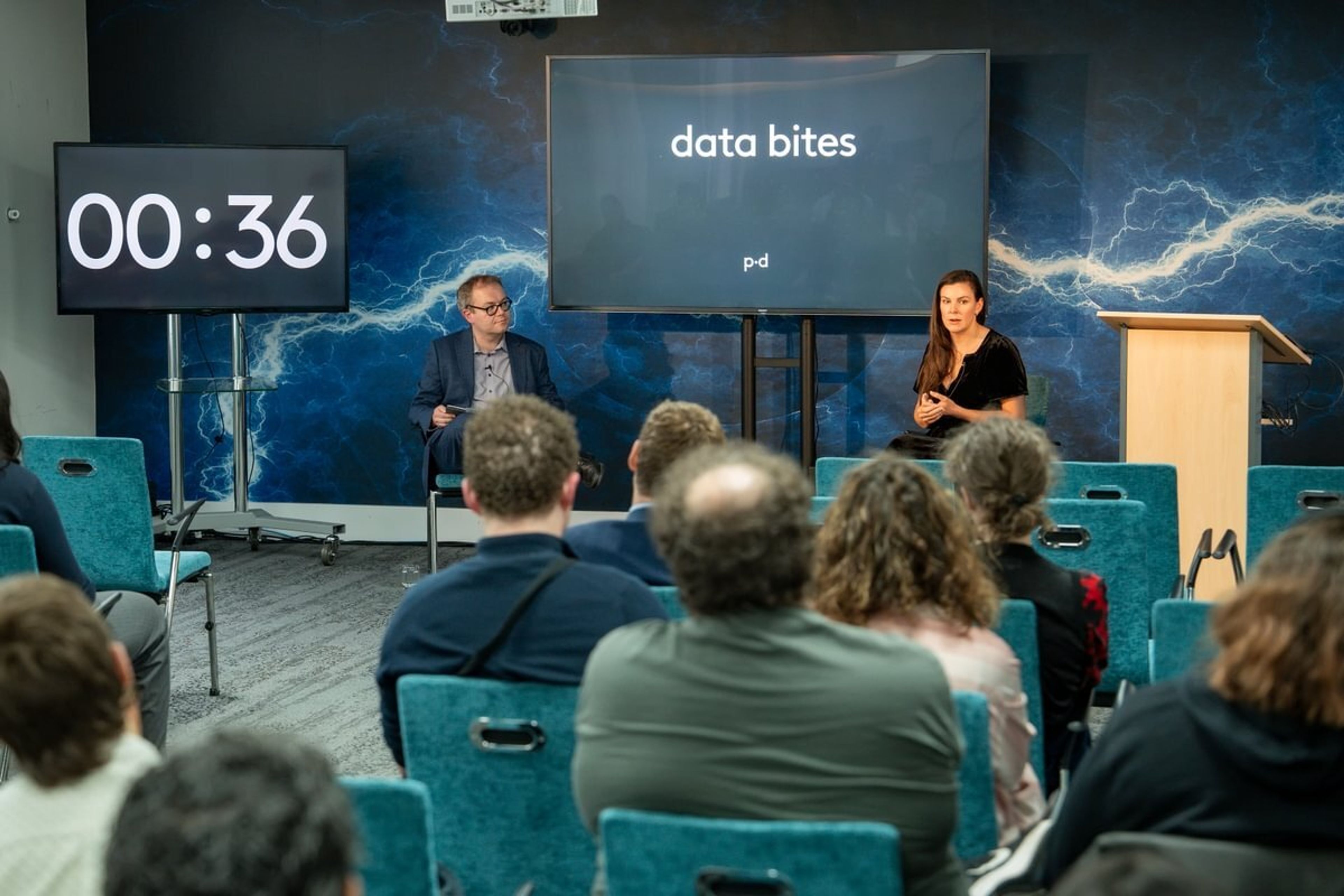 Laura Gilbert takes question from the audience alongside host Gavin Freeguard