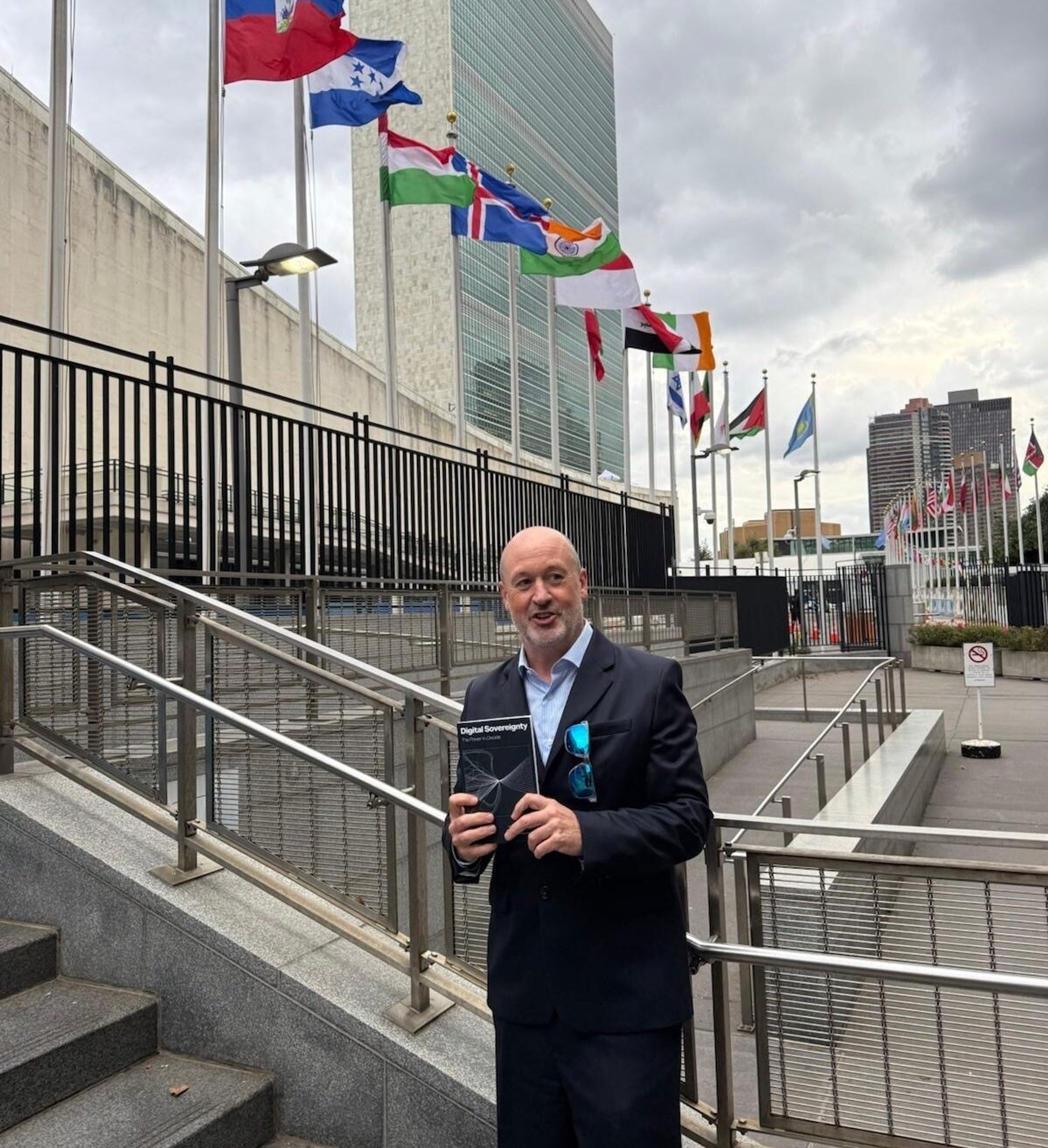 Mike Bracken unveils the book at the United Nations