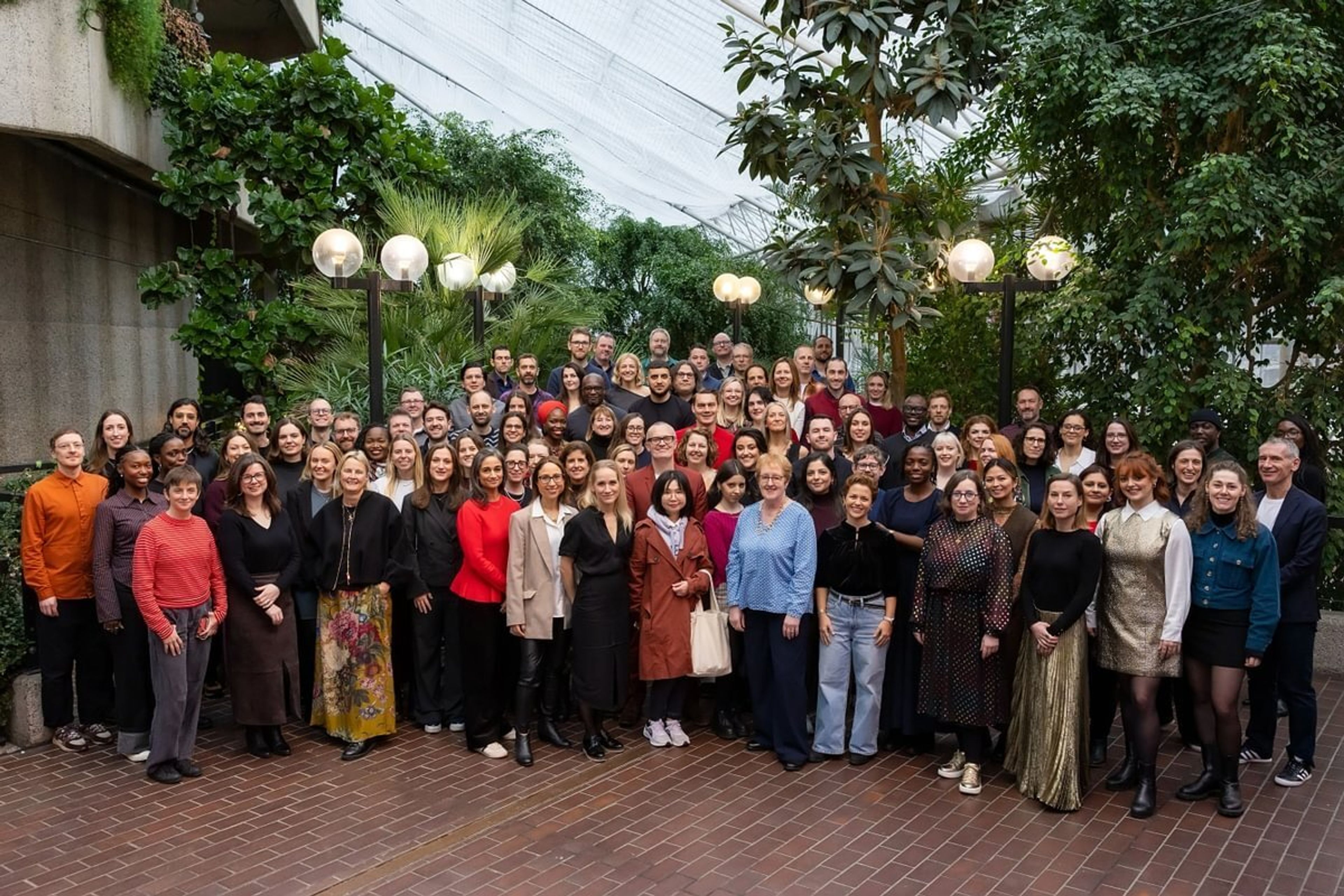 The whole team at PD stands for a group picture