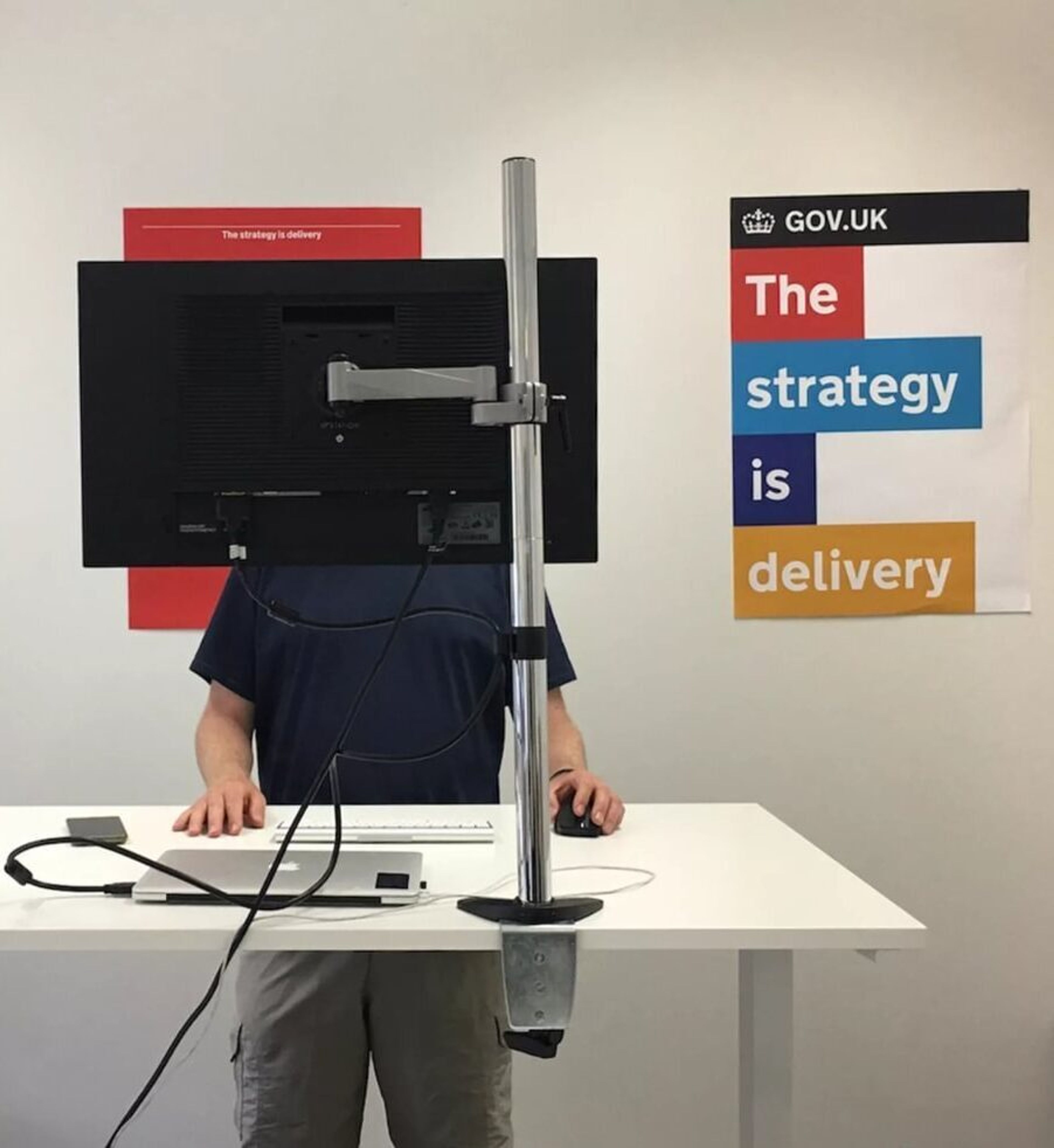 Tom-trying-out-standing-desk-Medium.jpg