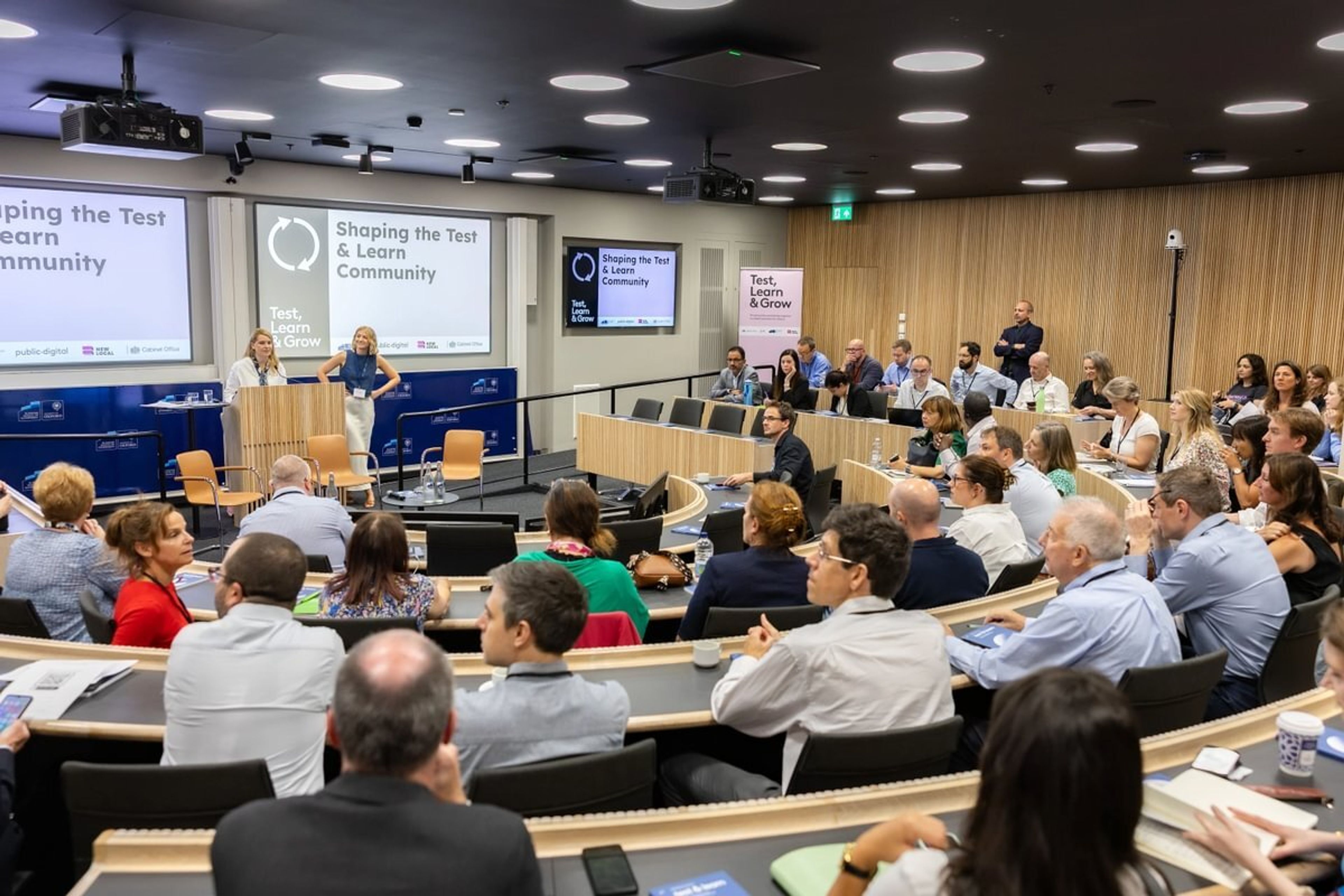 Delegates attend to speakers opening the ceremony