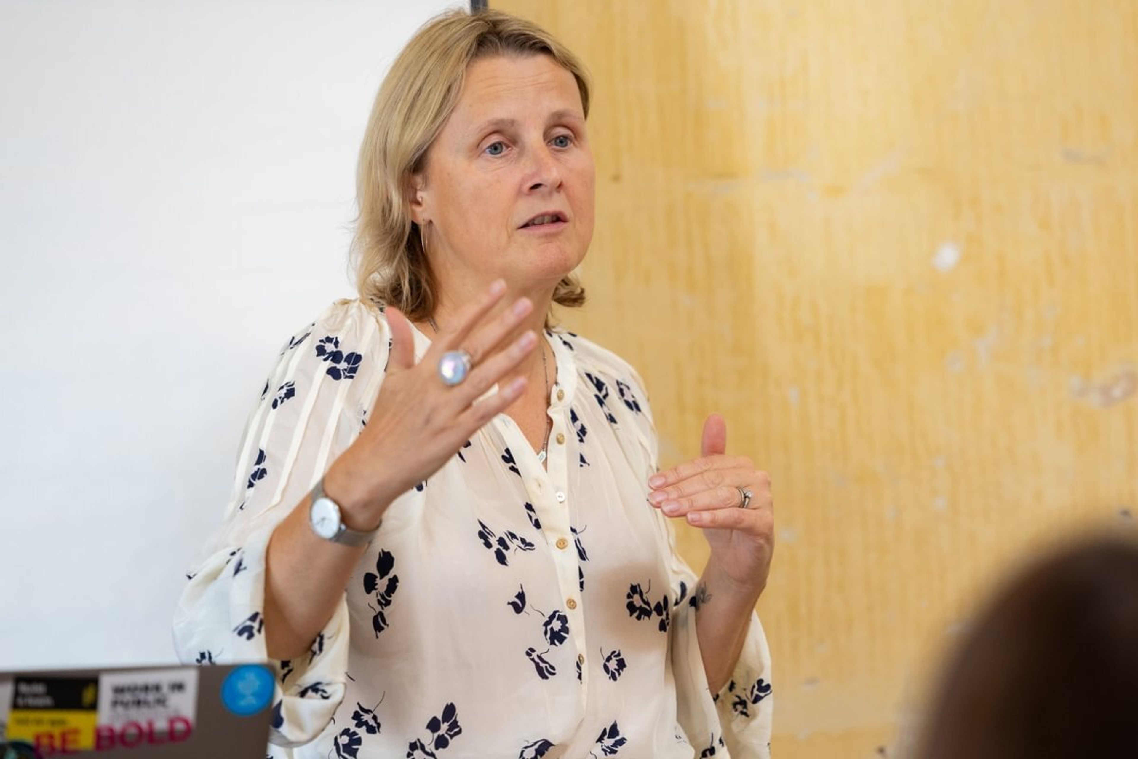Woman addresses an audience