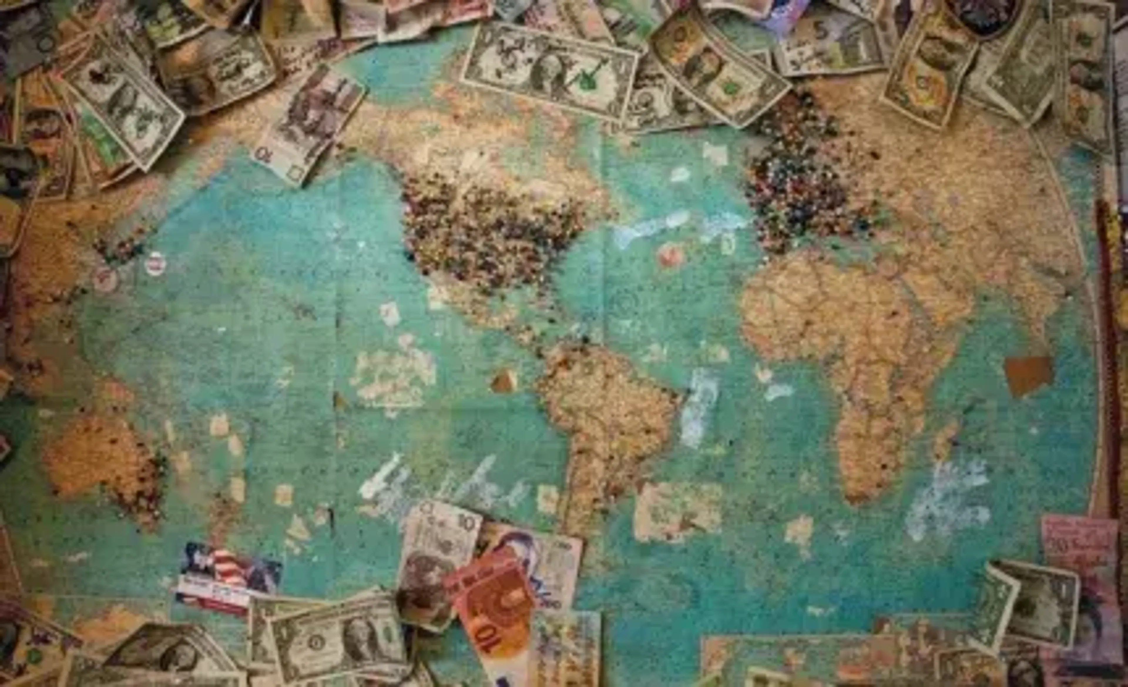 world map and cash