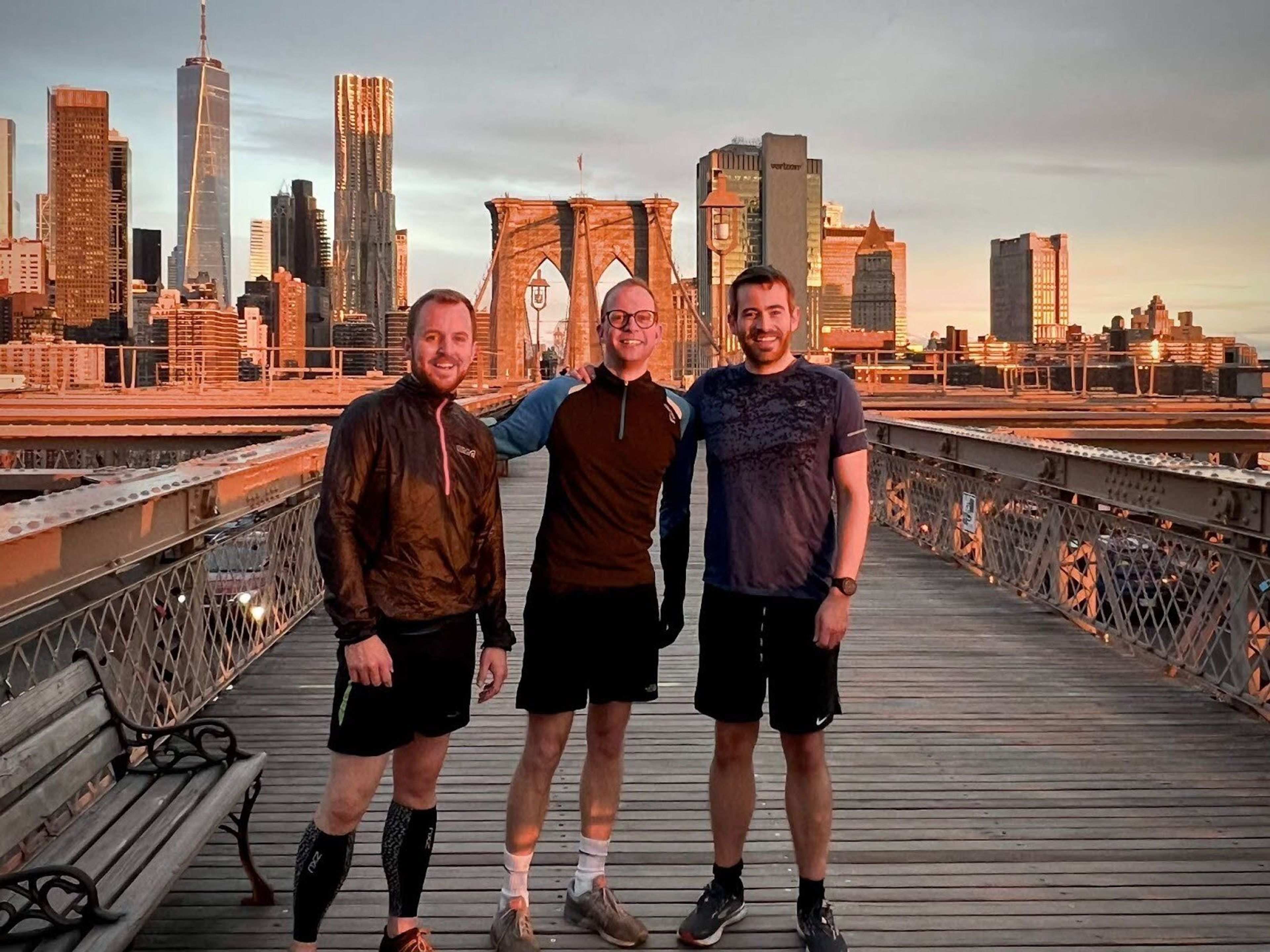 Three men in the Brooklun Bridge, New York