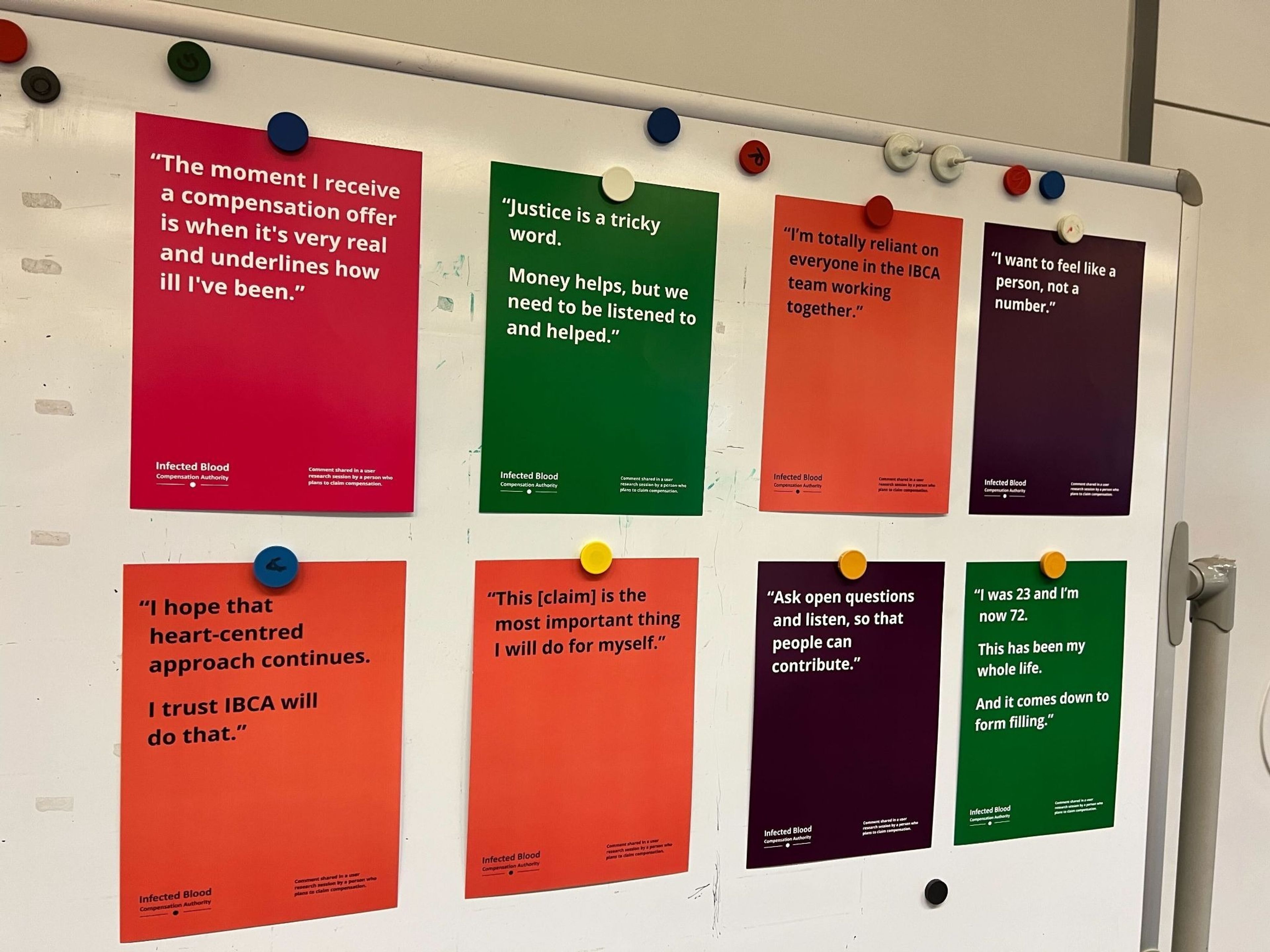 A noticeboard showing 8 user research quotes gathered by the IBCA team.